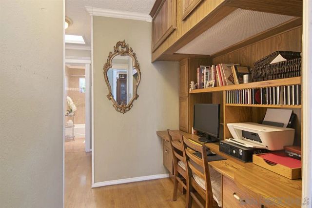 a view of a workspace with furniture