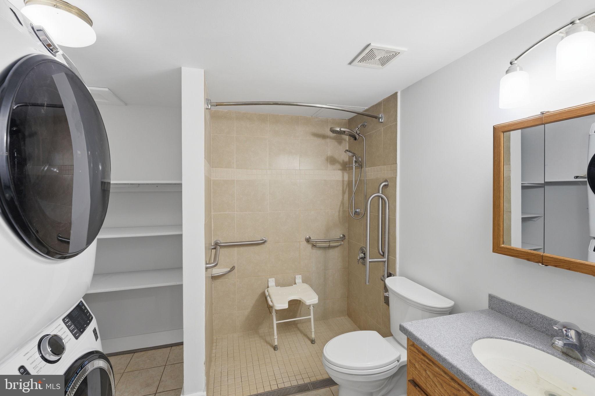7522 Stubbs Bridge Road Spotsylvania, VA 22551 - Photo 30 of 60 a bathroom with a toilet a sink and shower