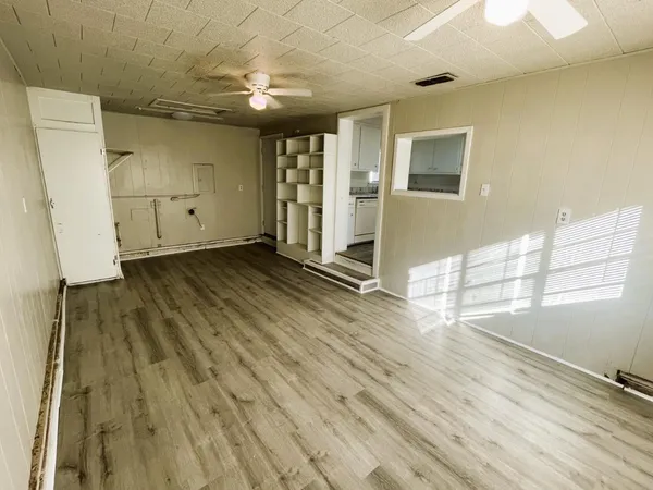 a view of an empty room and window