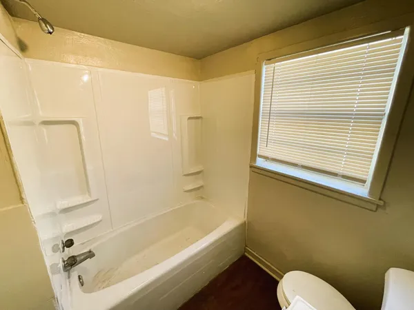 a bathroom with a sink and a bathtub