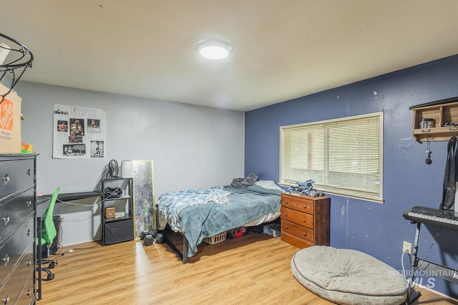 10 Reseda Ridge Circle Garden Valley, ID 83622 - Photo 23 of 28 Bedroom featuring wood finished floors