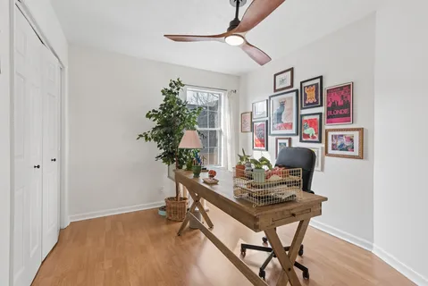 a view of a workspace with furniture
