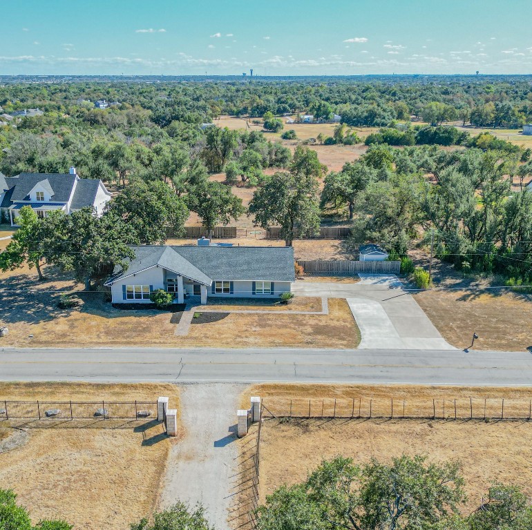 1008 Cedar Park Drive Cedar Park, TX 78613 - Photo 1 of 1 an aerial view of a house with a yard and lake view