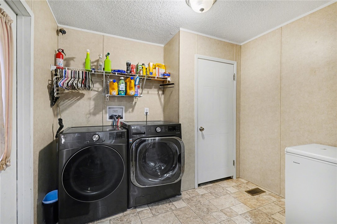 1004 Chapman Road Honea Path, SC 29654 - Photo 25 of 30 This dedicated laundry space offers convenience and efficiency for daily chores.