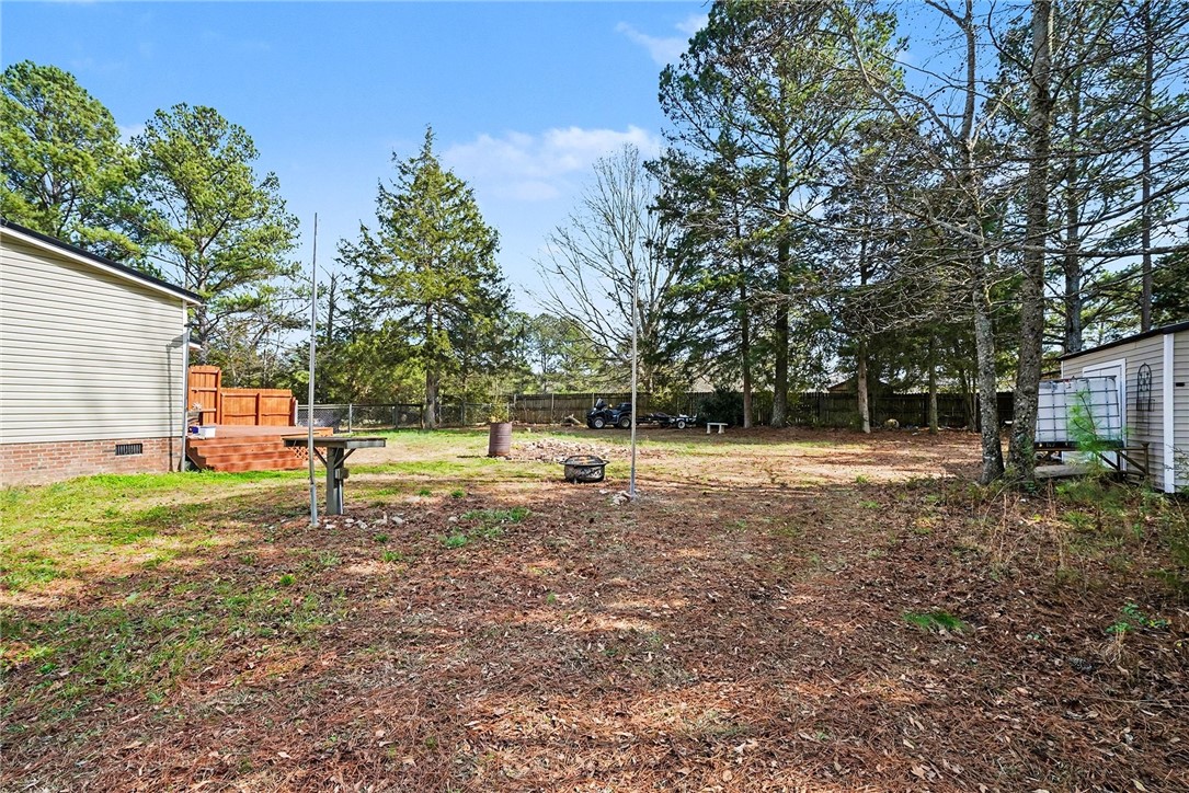 1004 Chapman Road Honea Path, SC 29654 - Photo 26 of 30 This spacious yard offers a serene retreat with ample room for outdoor activities.