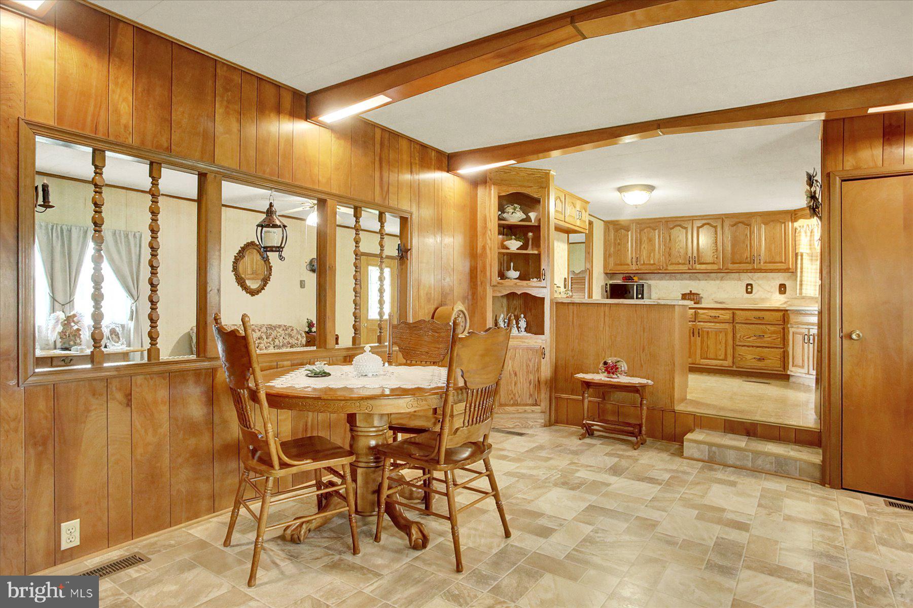 72 Cedar Grove Road Mifflintown, PA 17059 - Photo 11 of 31 a dining room with furniture and a large window