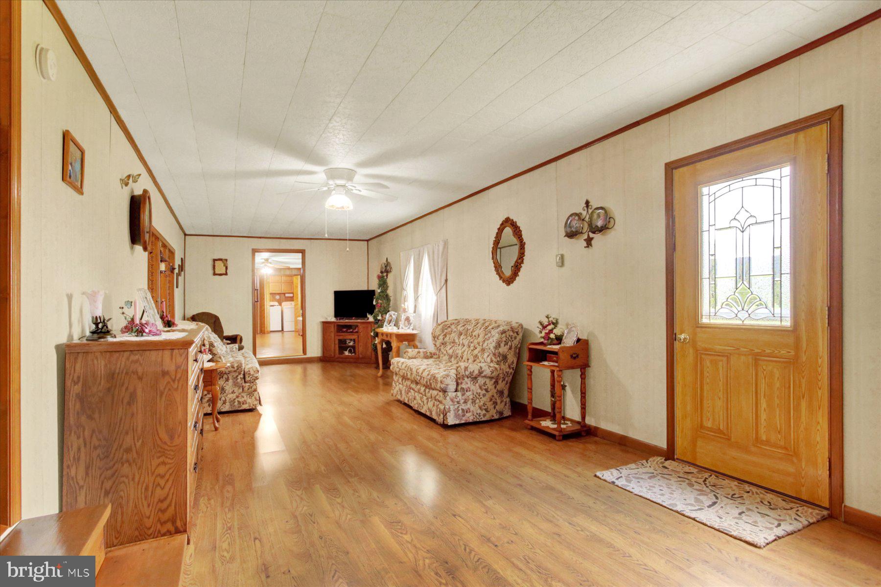 72 Cedar Grove Road Mifflintown, PA 17059 - Photo 13 of 31 a living room with furniture and a window