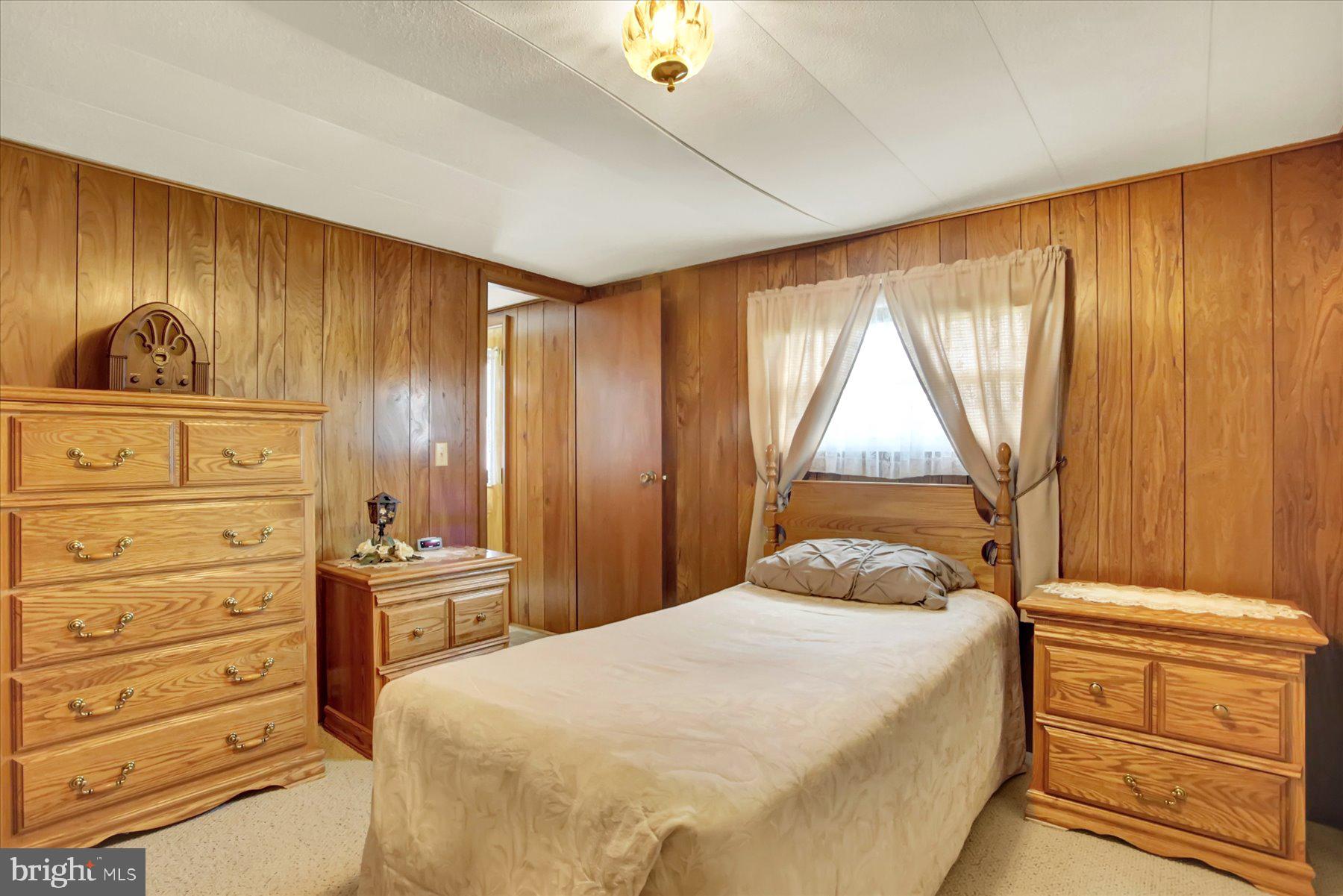 72 Cedar Grove Road Mifflintown, PA 17059 - Photo 19 of 31 a bedroom with a bed and a window