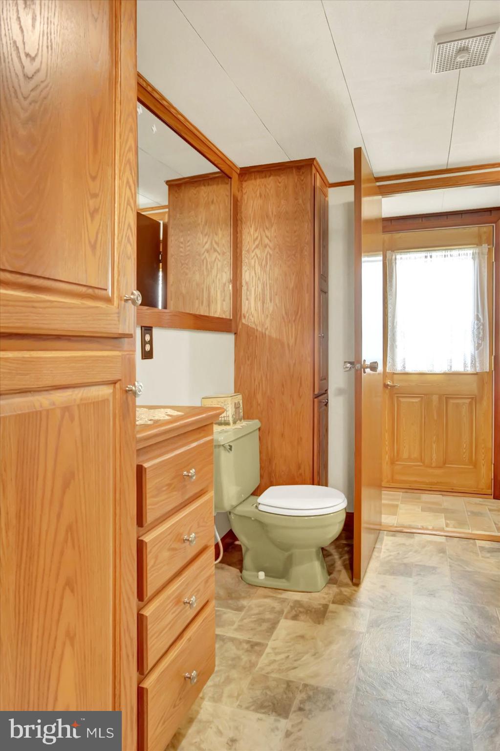 72 Cedar Grove Road Mifflintown, PA 17059 - Photo 20 of 31 a bathroom with a toilet a sink and a shower