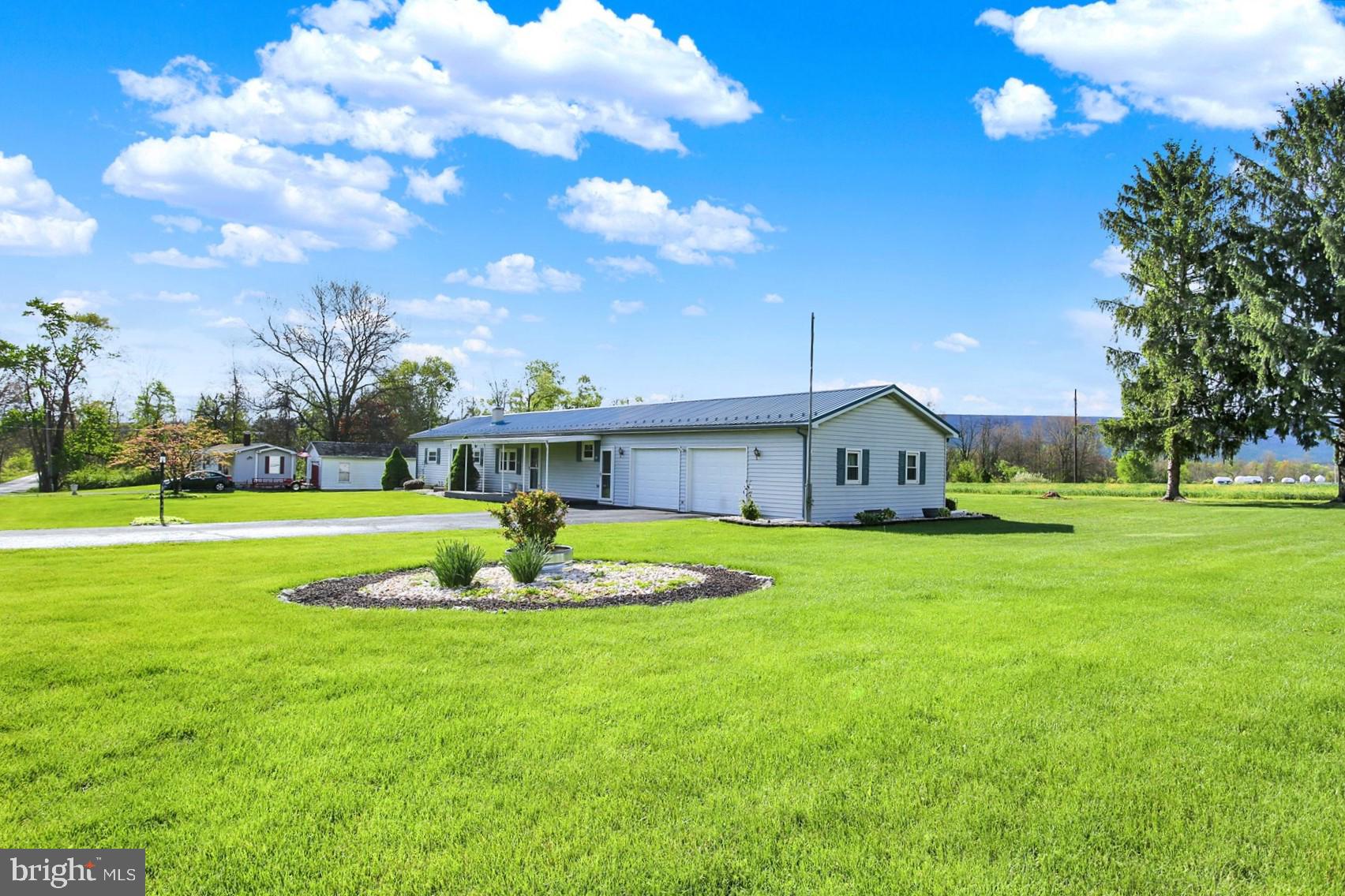 72 Cedar Grove Road Mifflintown, PA 17059 - Photo 2 of 31 a front view of house with yard and green space