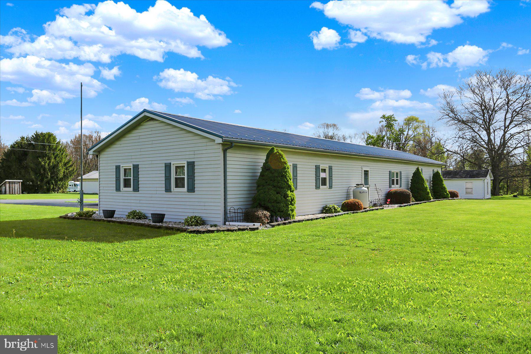 72 Cedar Grove Road Mifflintown, PA 17059 - Photo 4 of 31 a view of a house with a big yard