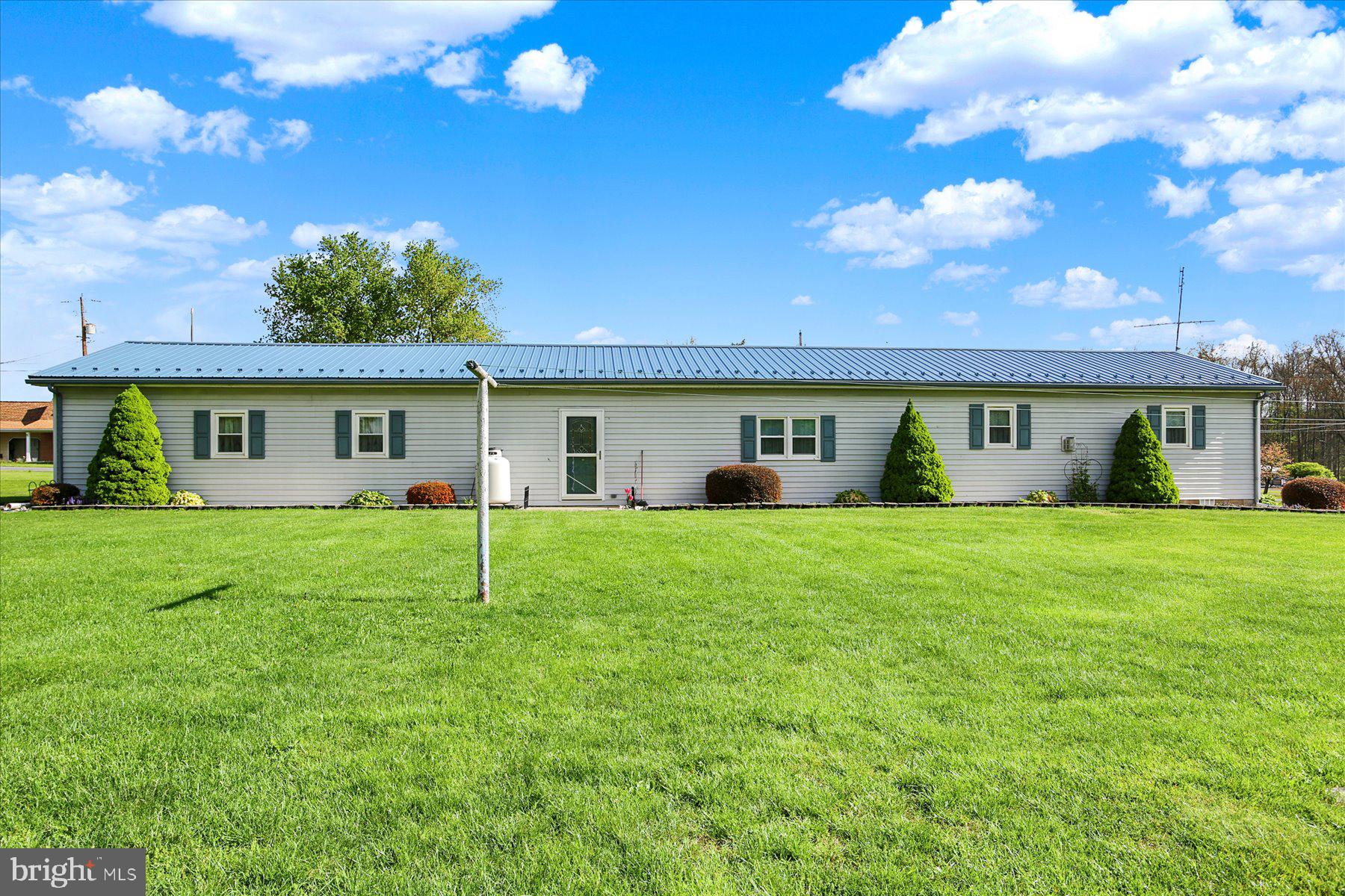 72 Cedar Grove Road Mifflintown, PA 17059 - Photo 5 of 31 a view of a house with a back yard