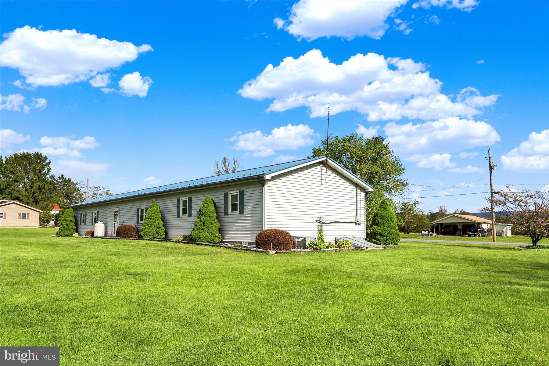 72 Cedar Grove Road Mifflintown, PA 17059 - Photo 6 of 31 a view of a house with yard and sitting area