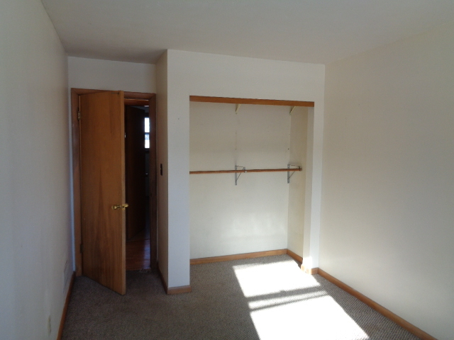 413 Phyllis Avenue Rochelle, IL 61068 - Photo 9 of 17 wooden floor in an empty room