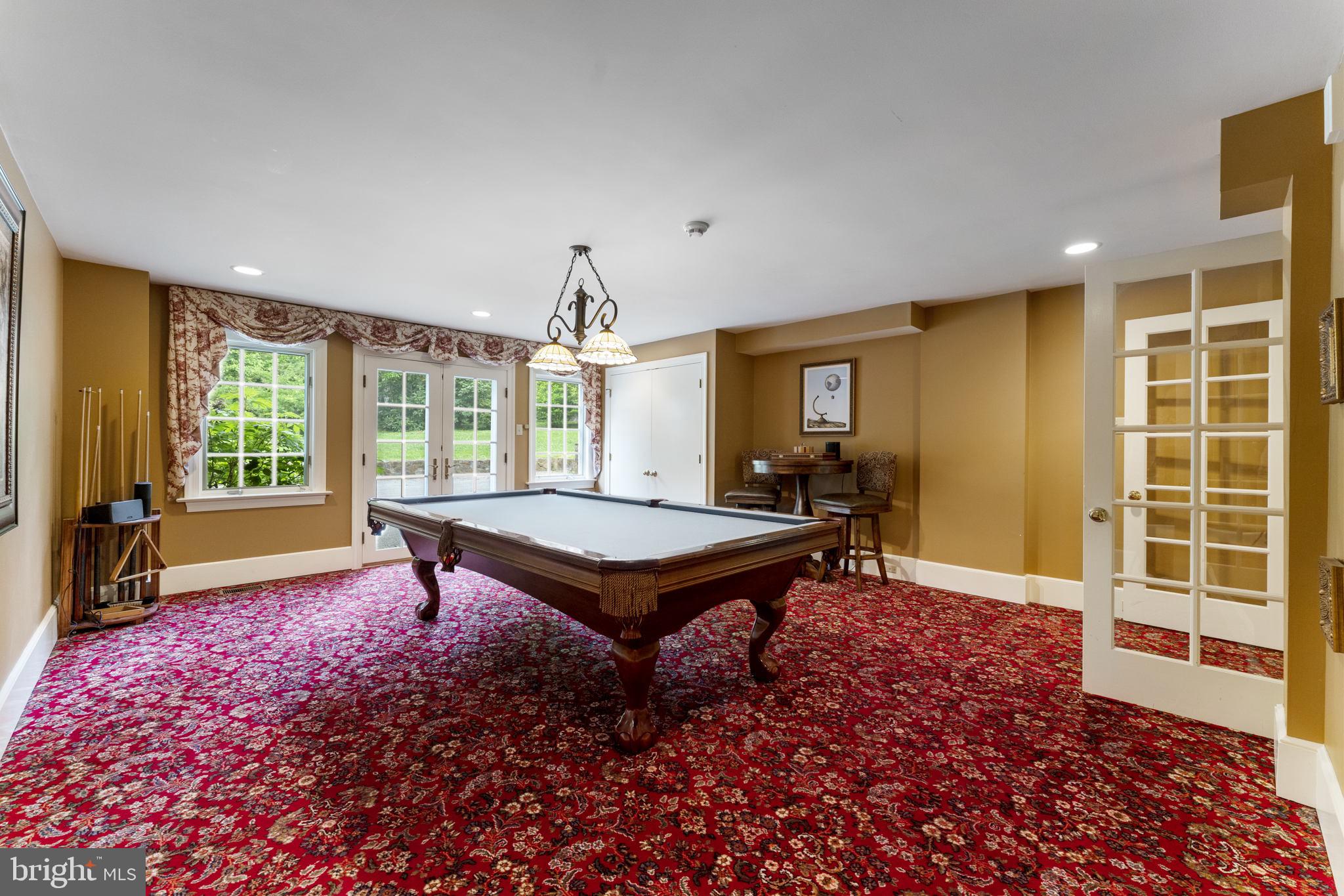 569 County Line Road Wayne, PA 19087 - Photo 14 of 64 Game Room with Outside Access via French Doors
