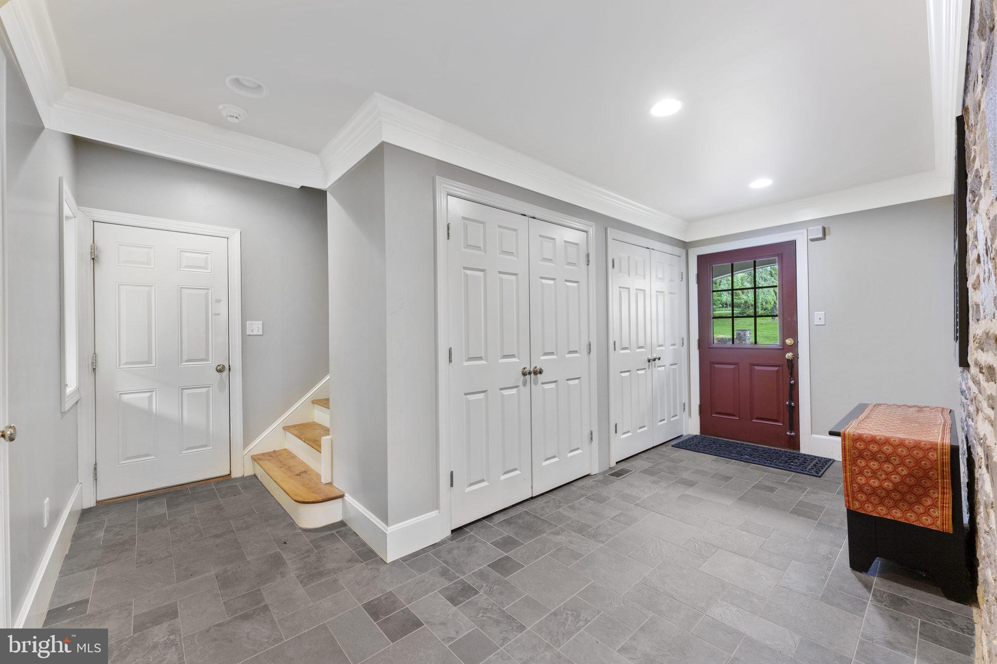 569 County Line Road Wayne, PA 19087 - Photo 41 of 64 Second Entrance Mud Room with Stone Floor & Wall