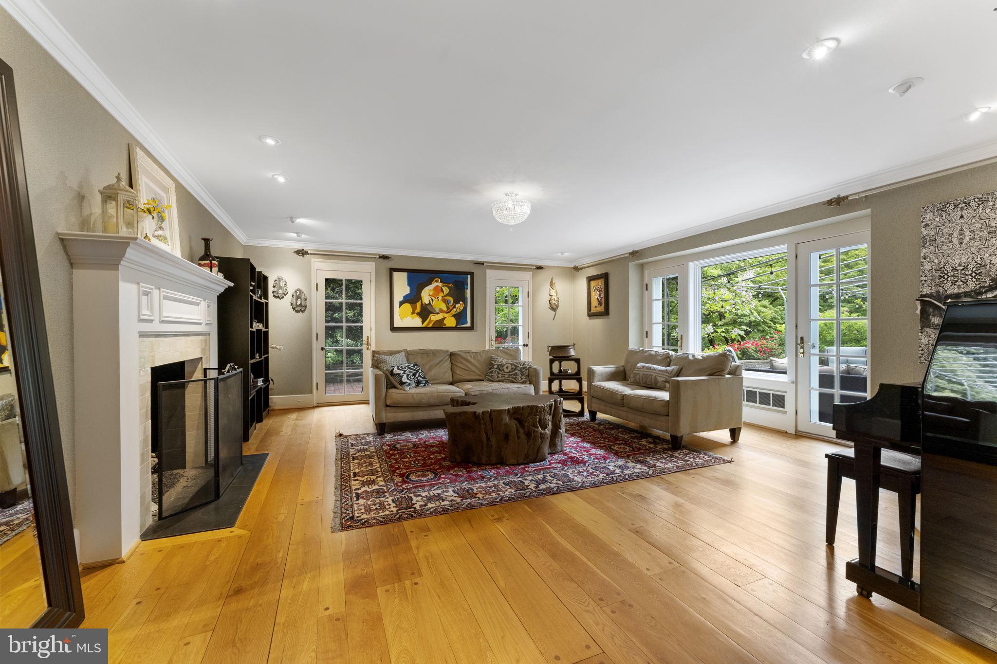 569 County Line Road Wayne, PA 19087 - Photo 9 of 64 Living Room opens to Private Terrace & Main Patio