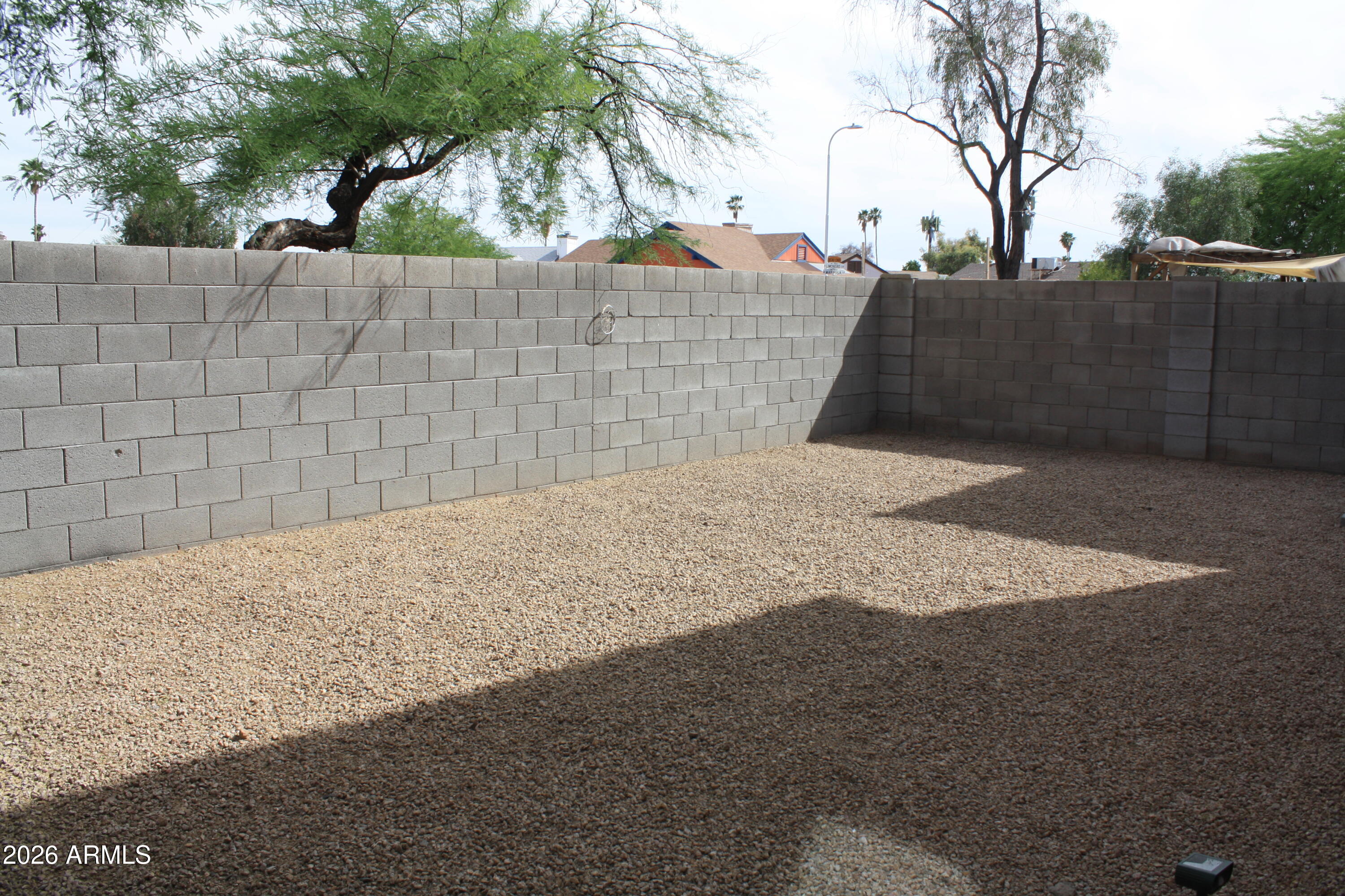 10225 West Camelback Road, Unit 19 Phoenix, AZ 85037 - Photo 40 of 51 a view of outdoor space and yard