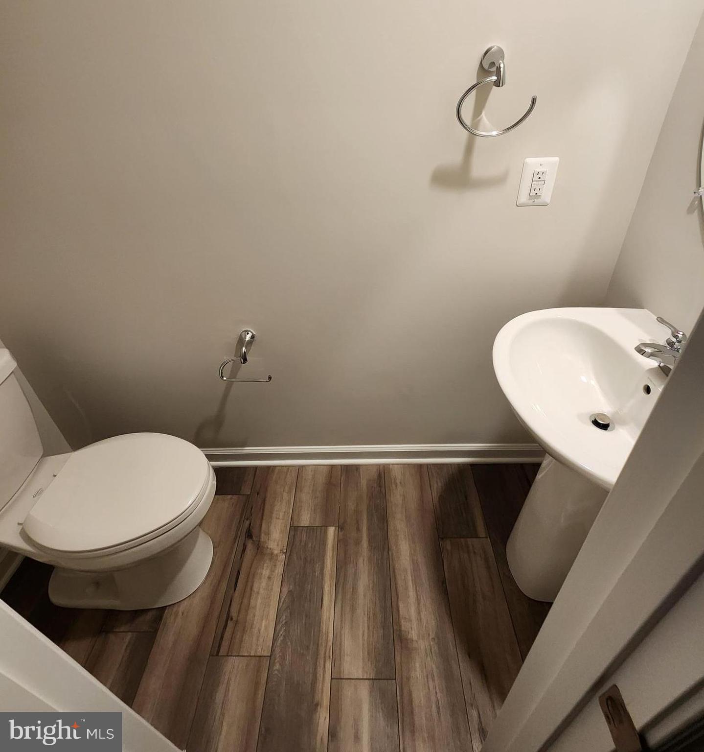 117 Canning Road Inwood, WV 25428 - Photo 19 of 41 a bathroom with a toilet and a mirror
