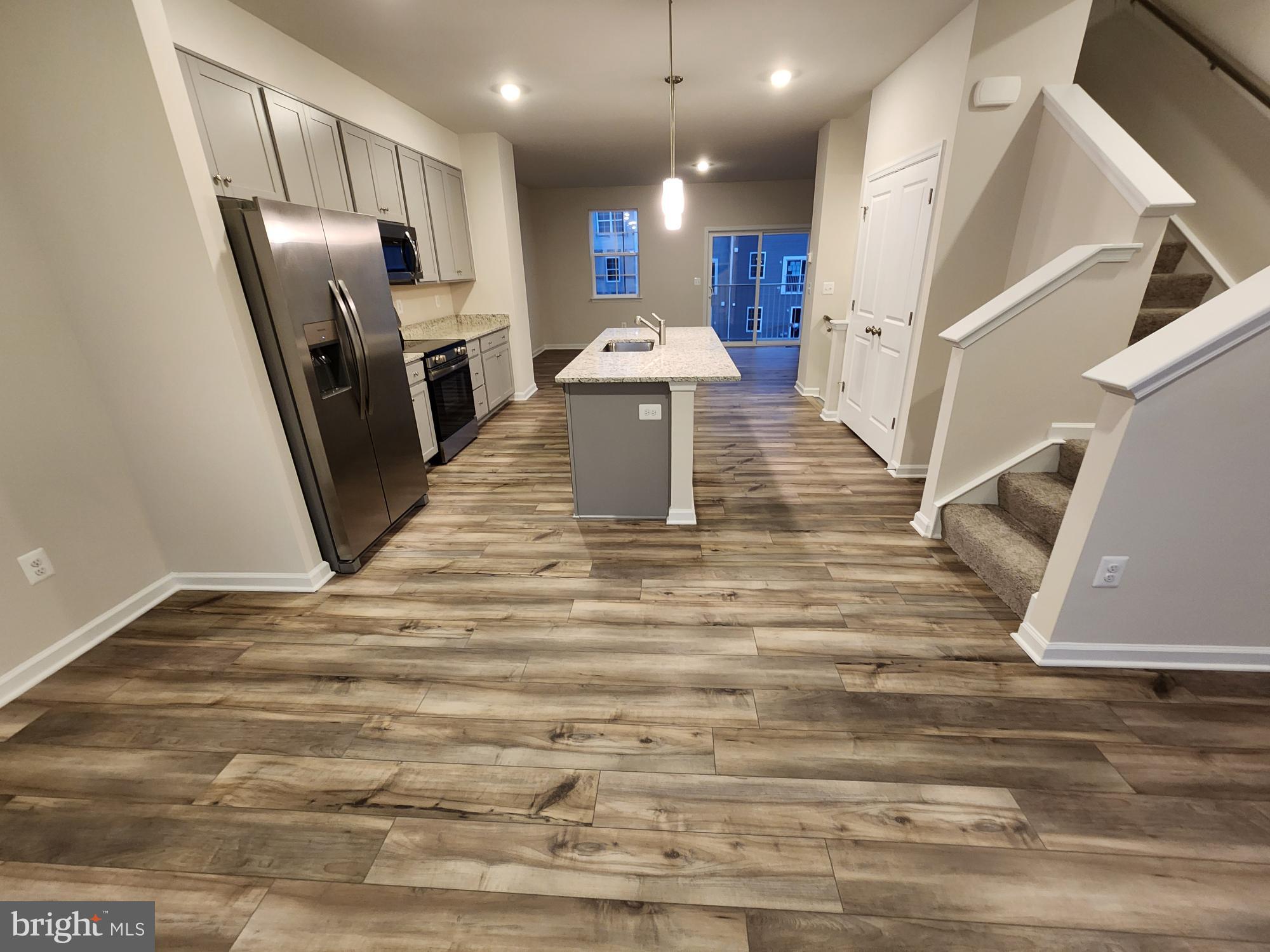 117 Canning Road Inwood, WV 25428 - Photo 2 of 41 a view of a kitchen from a ceiling room