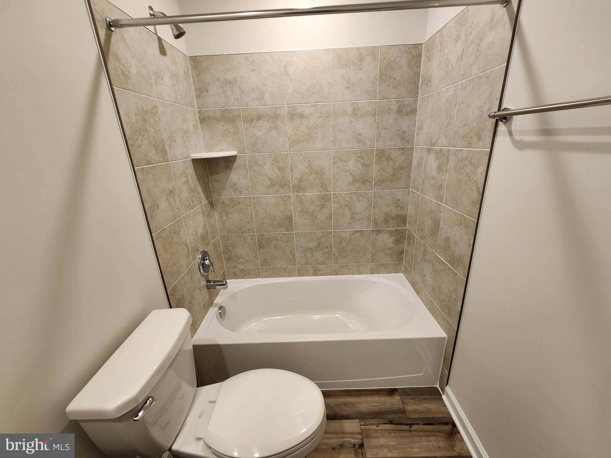 117 Canning Road Inwood, WV 25428 - Photo 29 of 41 a bathroom with a sink and a bathtub