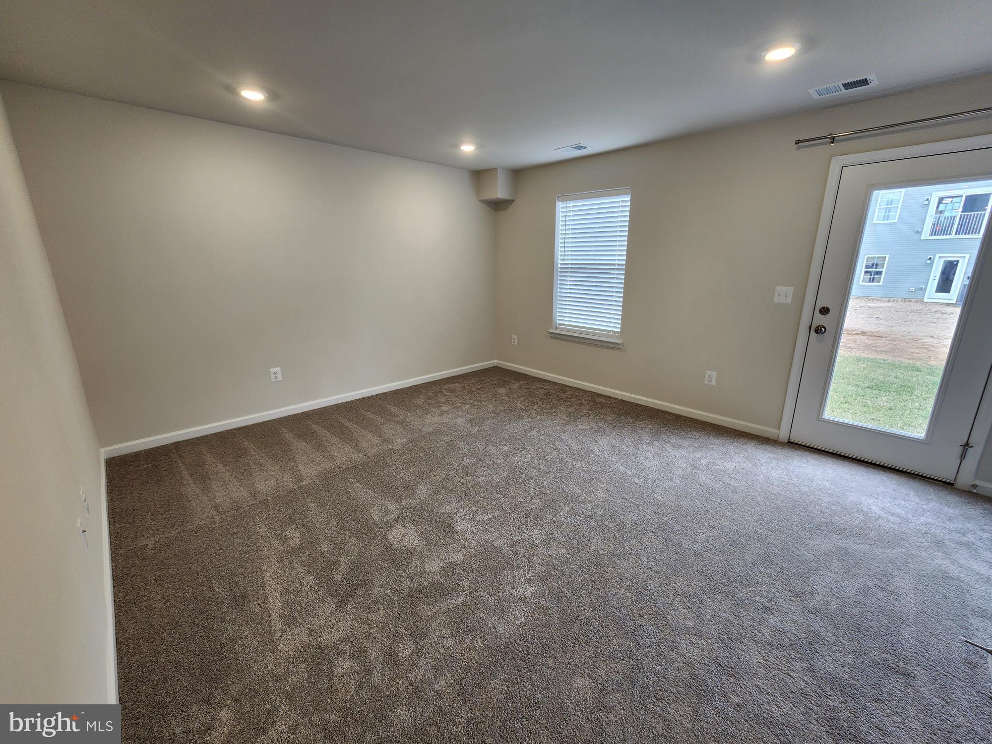 117 Canning Road Inwood, WV 25428 - Photo 32 of 41 an empty room with windows