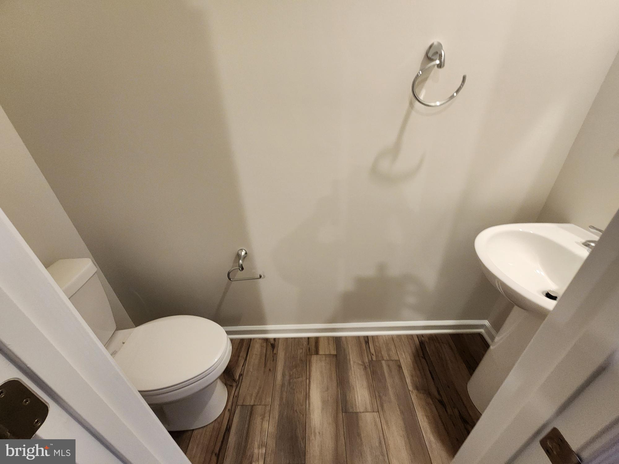 117 Canning Road Inwood, WV 25428 - Photo 36 of 41 a bathroom with a toilet and sink