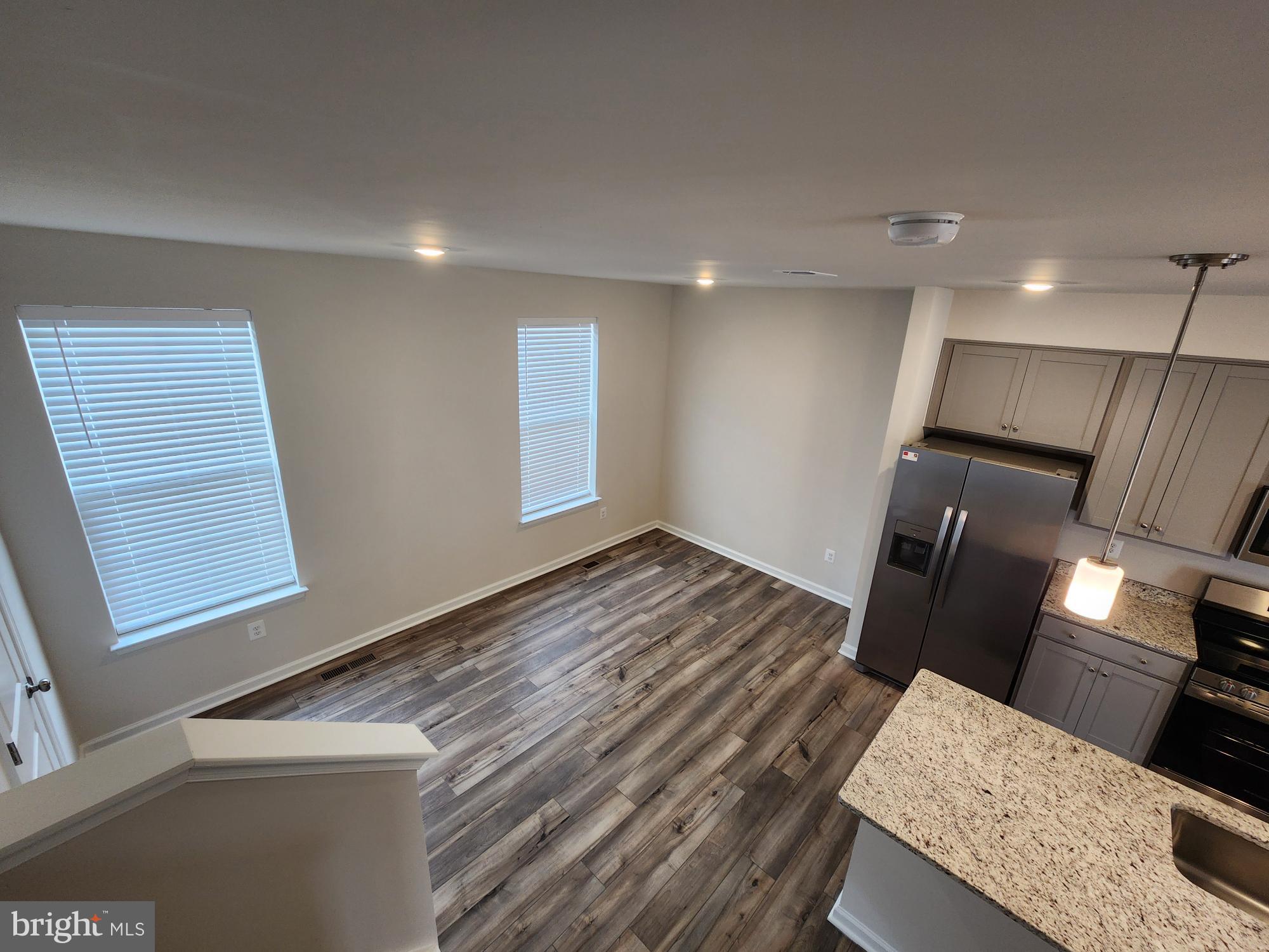 117 Canning Road Inwood, WV 25428 - Photo 4 of 41 a view of a kitchen and wooden floor