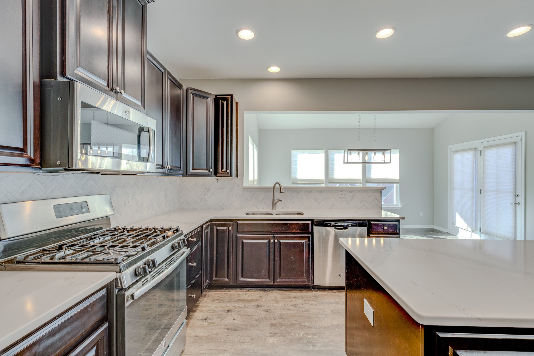 2704 Orleans Drive Columbia, TN 38401 - Photo 21 of 54 a kitchen with a stove and a sink