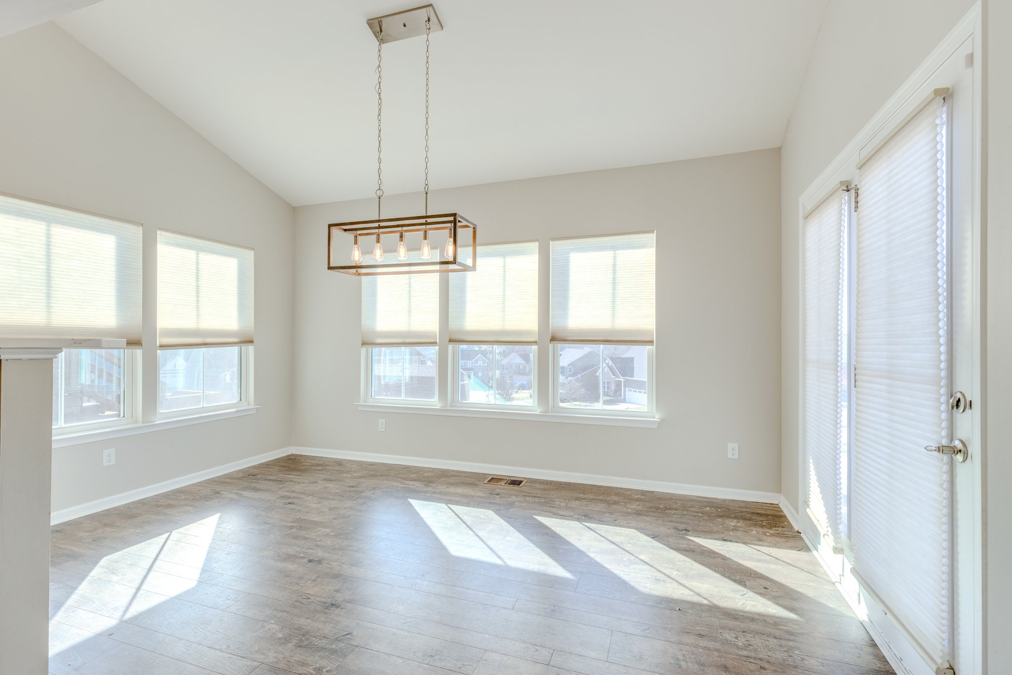 2704 Orleans Drive Columbia, TN 38401 - Photo 22 of 54 a view of an empty room with wooden floor and a window