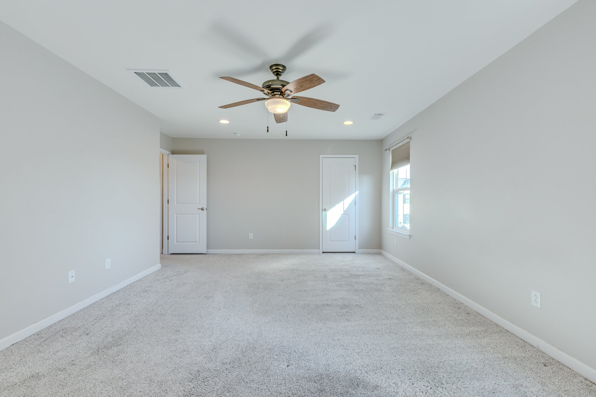 2704 Orleans Drive Columbia, TN 38401 - Photo 38 of 54 a view of a big room with chandelier fan and windows