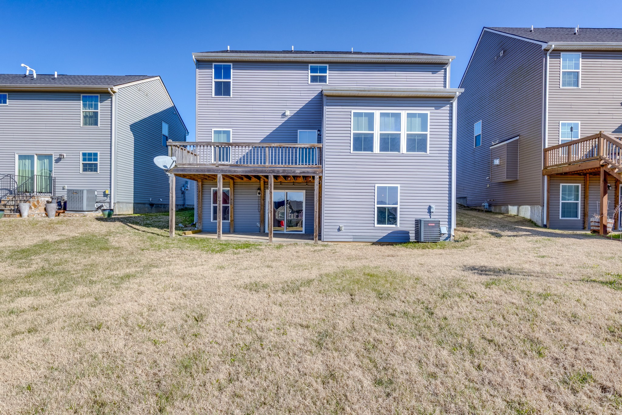 2704 Orleans Drive Columbia, TN 38401 - Photo 4 of 54 a front view of a house with a yard and garage