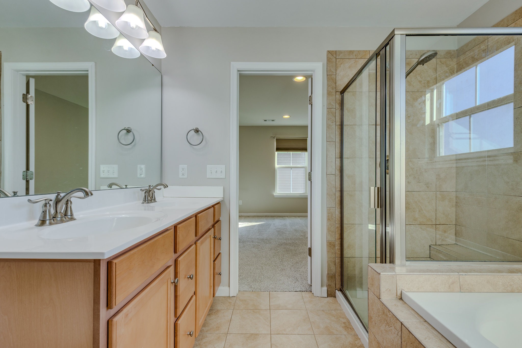 2704 Orleans Drive Columbia, TN 38401 - Photo 41 of 54 a bathroom with a sink vanity tub and shower