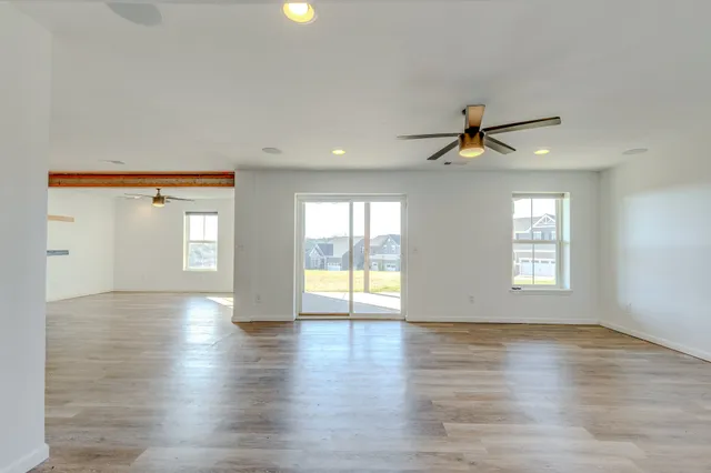 a view of a hallway with a window
