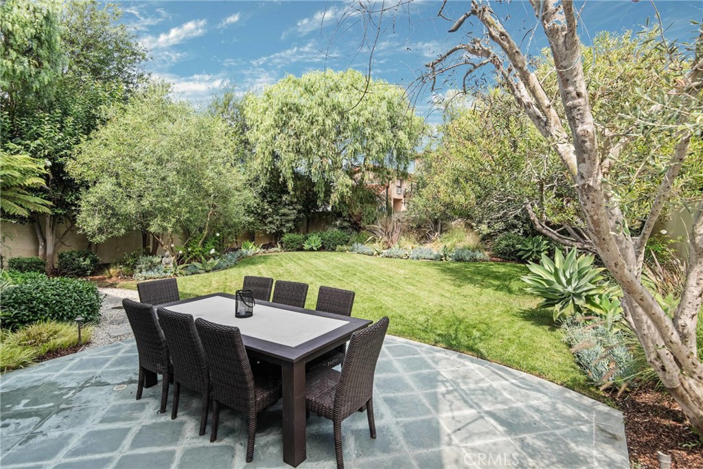 1427 Eighth Street Manhattan Beach, CA 90266 - Photo 45 of 47 a view of a dining table and chairs in the patio