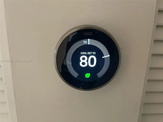 a view of a room with a hallway and a closet