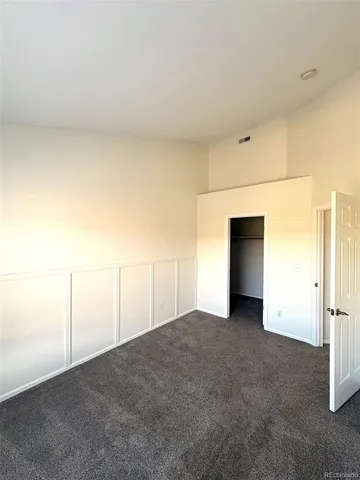 a bathroom with a tub sink and a mirror