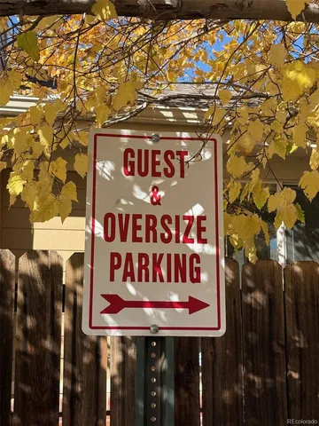 a view of street with parked cars