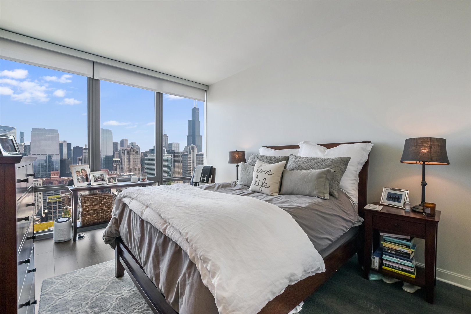 164 North Peoria Street, Unit 4004 Chicago, IL 60607 - Photo 13 of 32 a bedroom with a bed and a large window