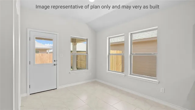 a view of an empty room with window