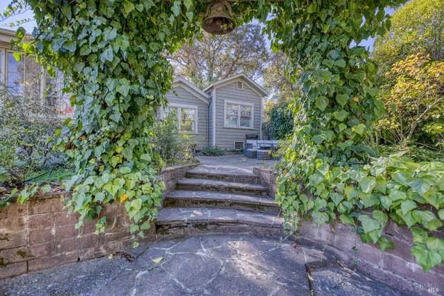 a view of a street with a building in the background