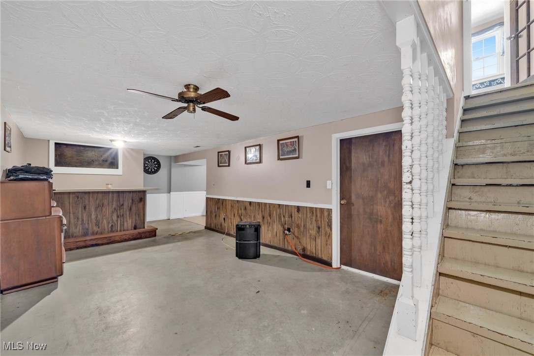 1583 Vermilion Road Vermilion, OH 44089 - Photo 22 of 41 Basement rec room featuring concrete floors, and a bar