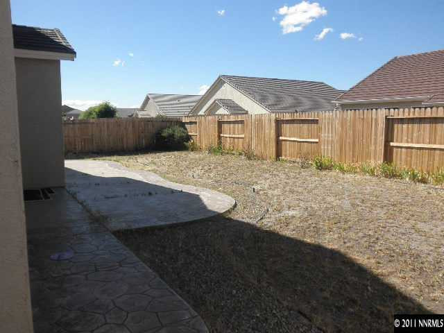 1625 Murrieta Court Reno, NV 89521 - Photo 3 of 10 a view of a house with a yard