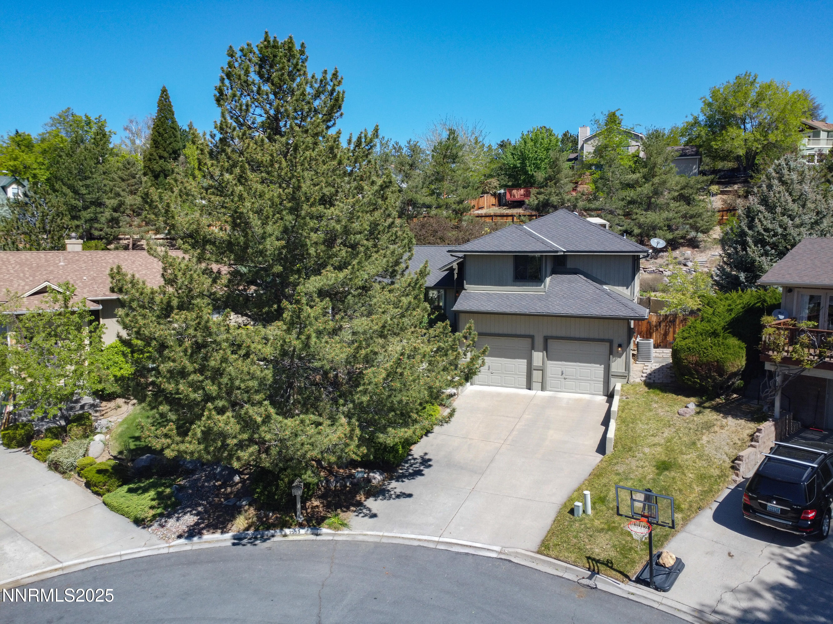2593 Chaparral Court Reno, NV 89509 - Photo 1 of 37 an aerial view of a house with a yard