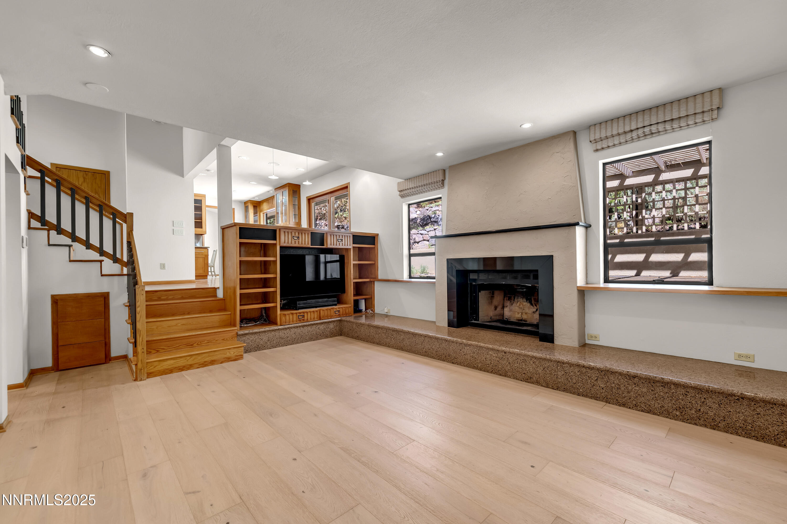 2593 Chaparral Court Reno, NV 89509 - Photo 14 of 37 a view of a livingroom with an empty room and fire place