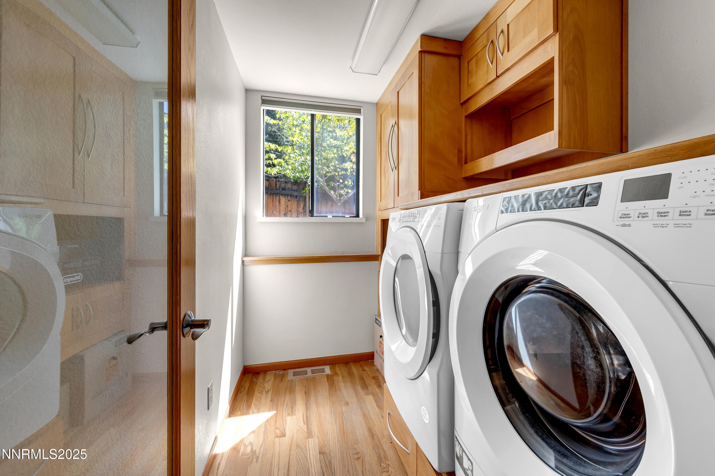 2593 Chaparral Court Reno, NV 89509 - Photo 18 of 37 a view of a bedroom with washer and dryer