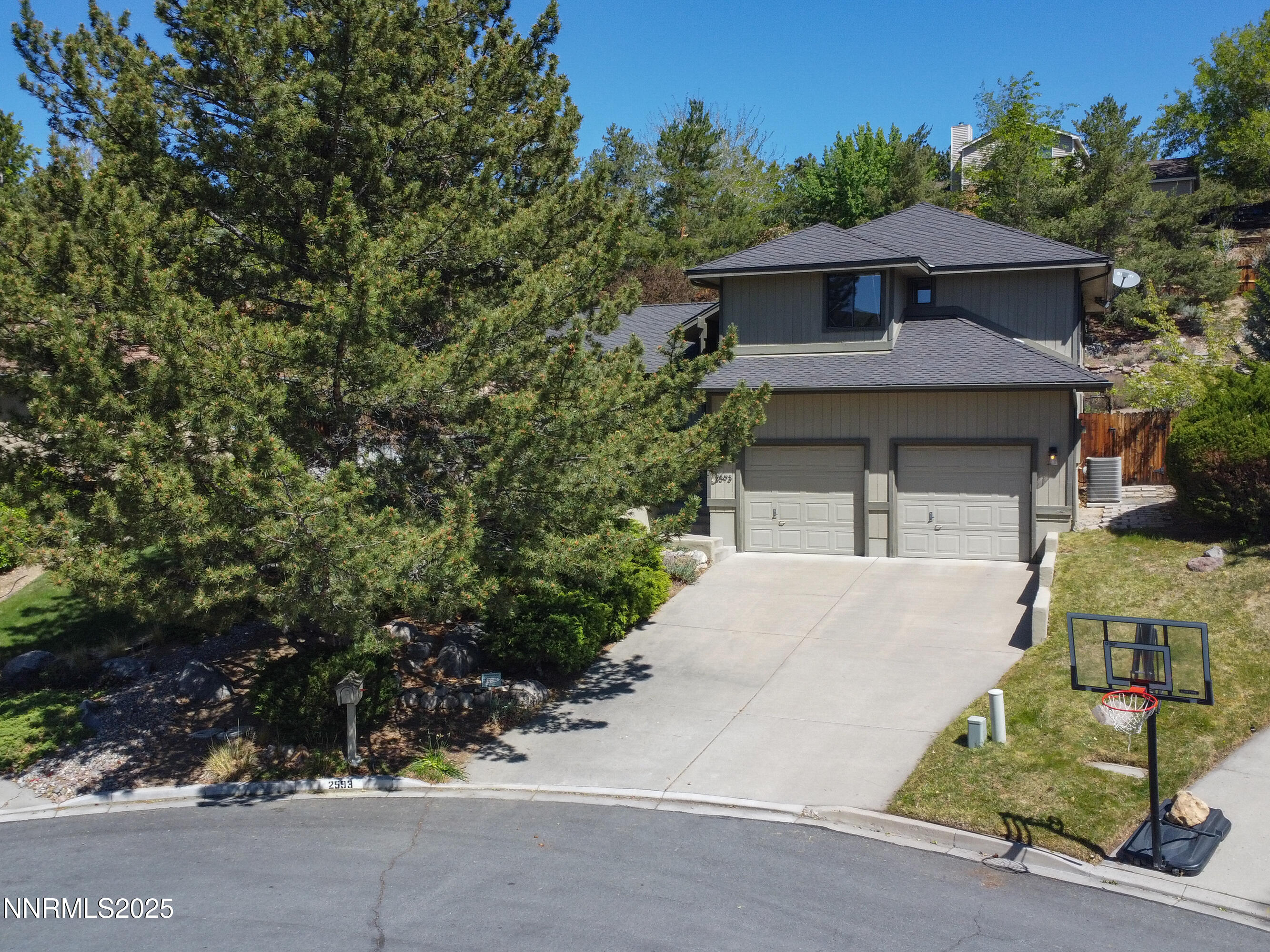 2593 Chaparral Court Reno, NV 89509 - Photo 2 of 37 front view of a house with a yard