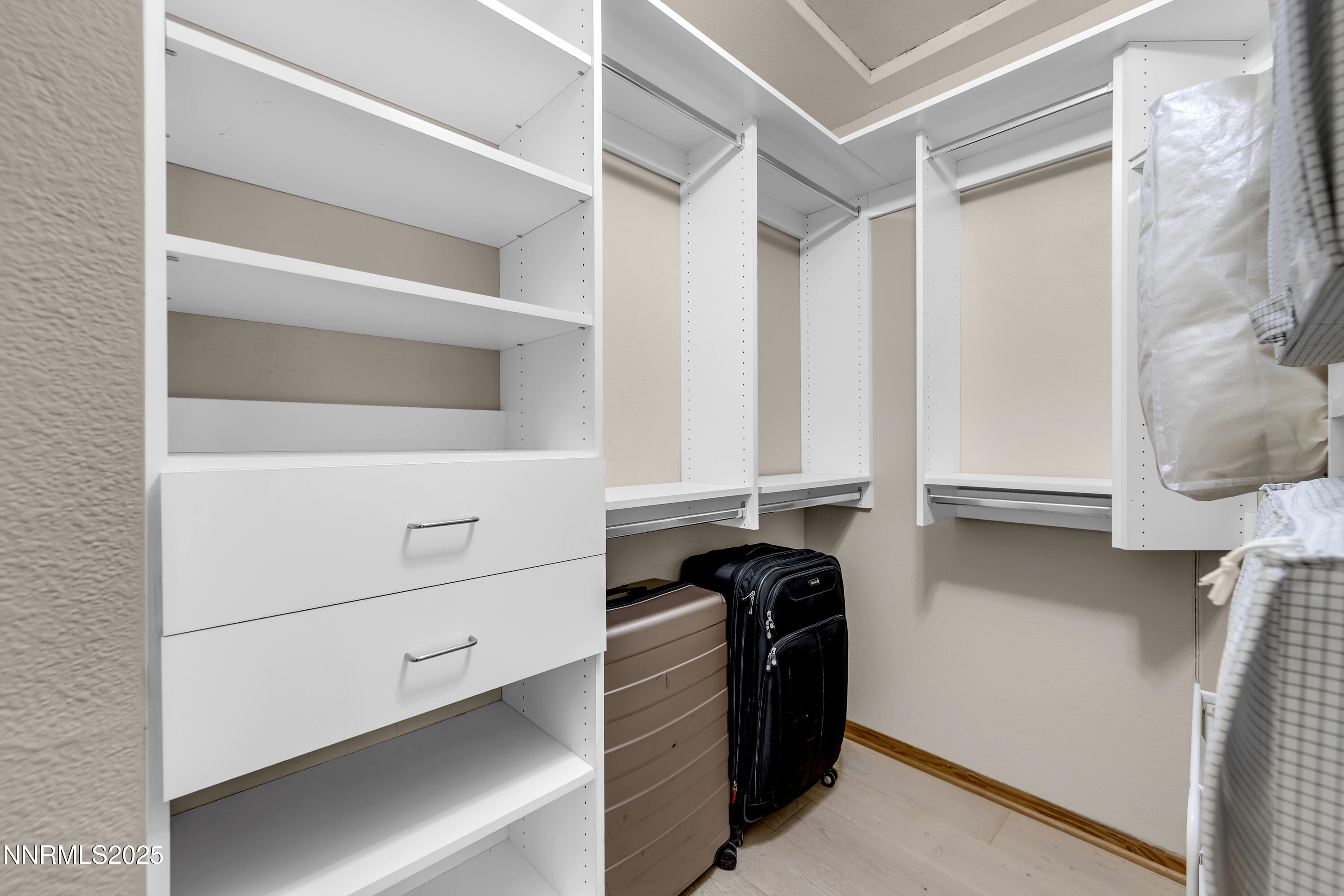 2593 Chaparral Court Reno, NV 89509 - Photo 23 of 37 a view of walk in closet with empty racks