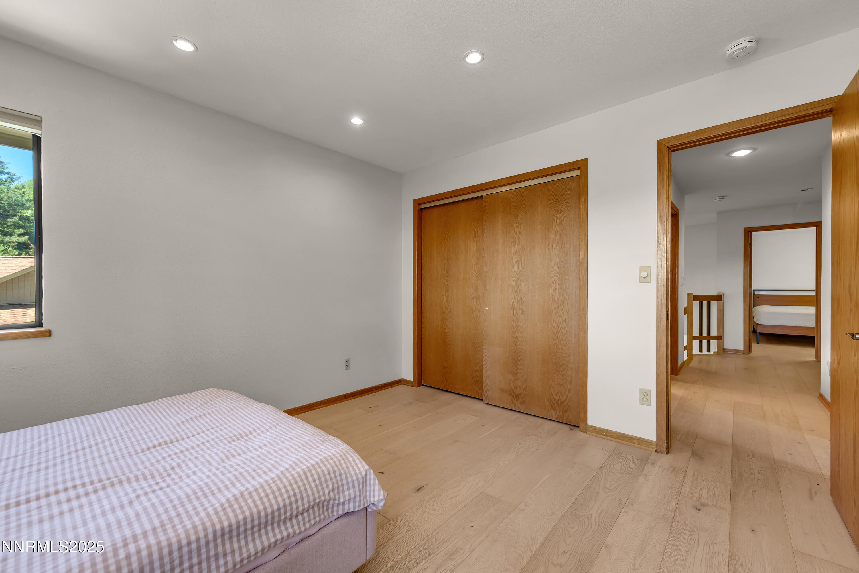 2593 Chaparral Court Reno, NV 89509 - Photo 25 of 37 a view of livingroom with hardwood floor and hallway