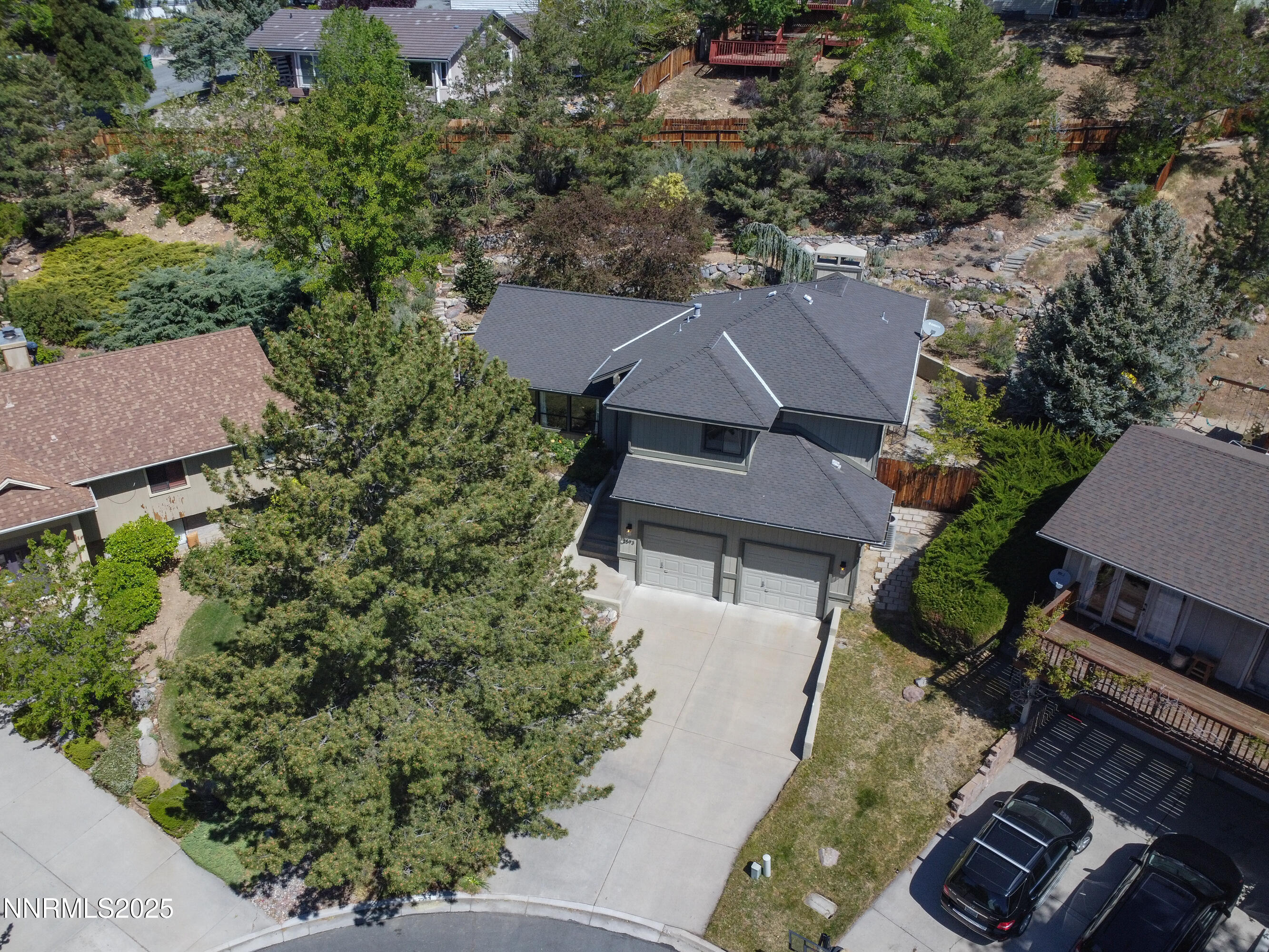 2593 Chaparral Court Reno, NV 89509 - Photo 3 of 37 an aerial view of multiple houses with yard